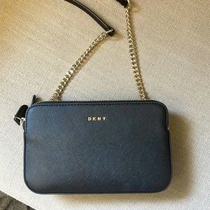 DKNY small, black leather purse.